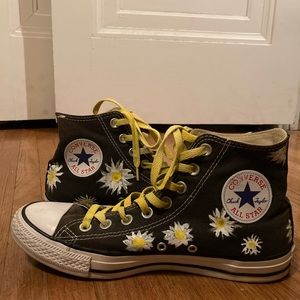 Hand painted flower chuck taylors.
